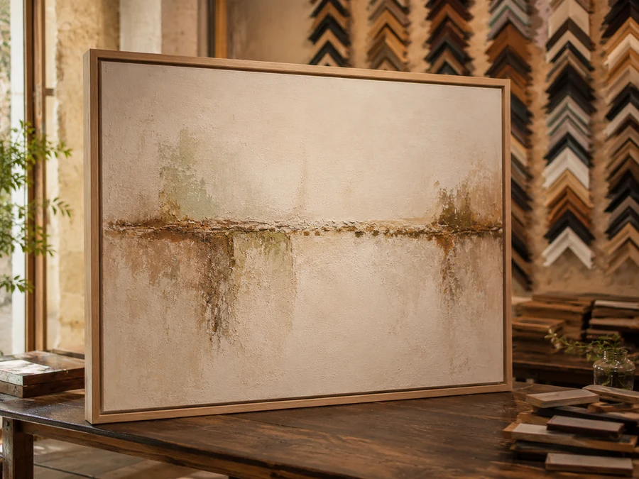 Lienzo abstracto enmarcado a medida con moldura de madera natural en el taller Pepe Davent